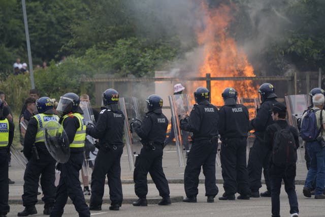 <p>A mob attacked a Holiday Inn Express housing asylum seekers in Rotherham on Sunday (Danny Lawson/PA)</p>