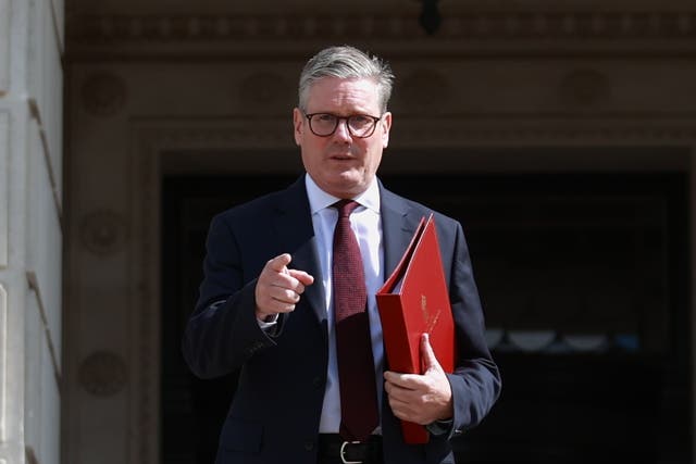 <p>Prime Minister Sir Keir Starmer leaves Parliament Buildings at Stormont, Belfast (Liam McBurney/PA)</p>