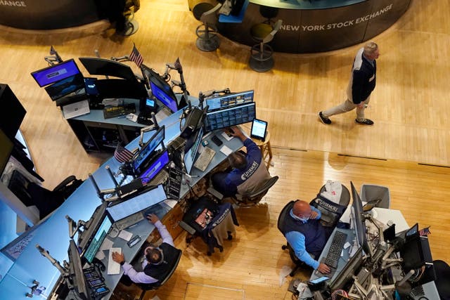 <p>Traders at work on the floor of New York Stock Exchange </p>