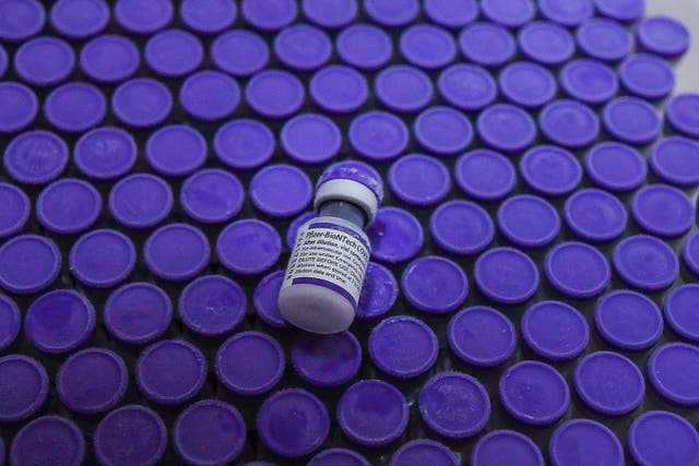 <p>Covid vaccine being taken to a freezer at the National Institute Of Hygiene And Epidemiology in Hanoi, Vietnam </p>