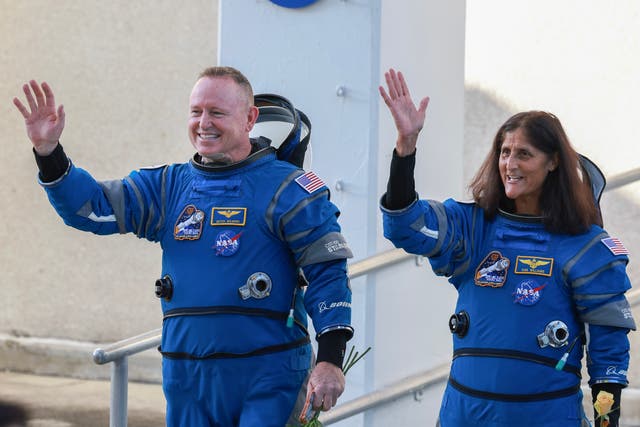 <p>Butch Wilmore (left) and Suni Williams (right) wave just before taking off in the Boeing Starliner spacecraft on June 5. Now, officials say their return to Earth will be delayed until at least June 26</p>