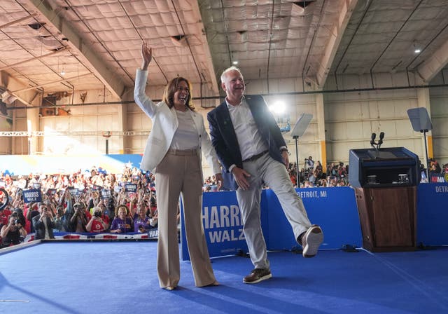 <p>Democratic presidential candidate, presidental nominee Kamala Harris and vice presidential candidate Minnesota Gov. Tim Walz appear on stage together during a campaign event. </p>