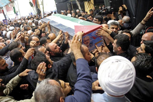 <p>Mourners carry the coffin of Hamas chief Ismail Haniyeh in Tehran </p>