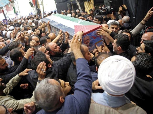 <p>Mourners carry the coffin of Hamas chief Ismail Haniyeh in Tehran </p>