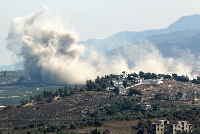 <p>Smoke billows from the site of an Israeli strike that targeted the southern Lebanese village of Kfar Kila</p>