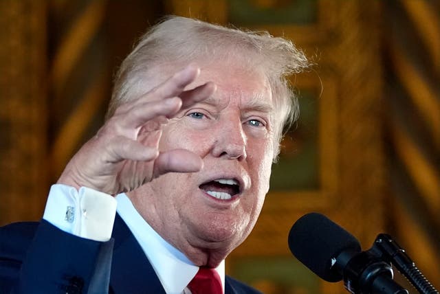 <p>Donald Trump gesticulates while ranting to reporters during a press conference at his Mar-a-Lago club on August 8</p>