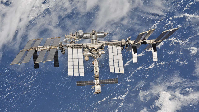 <p>International Space Station orbiting the Earth</p>